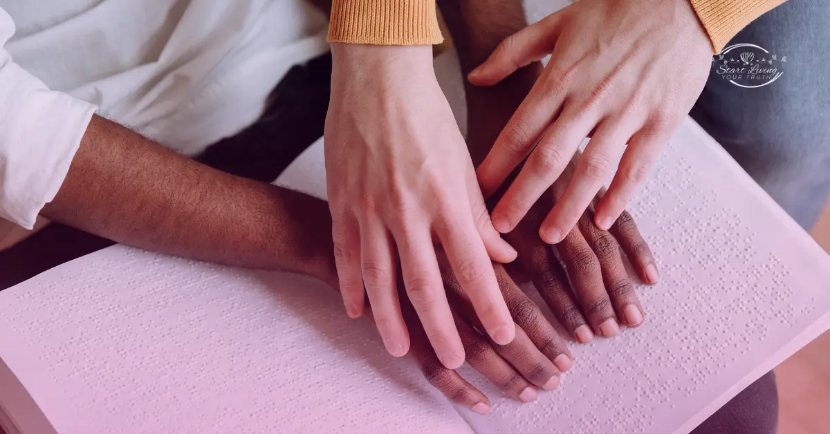 Hands reading Braille together on a book.