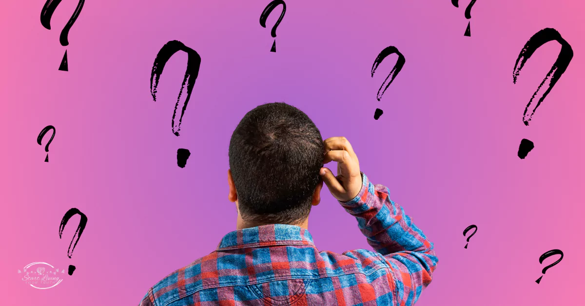 Man scratching head with question marks on pink background.